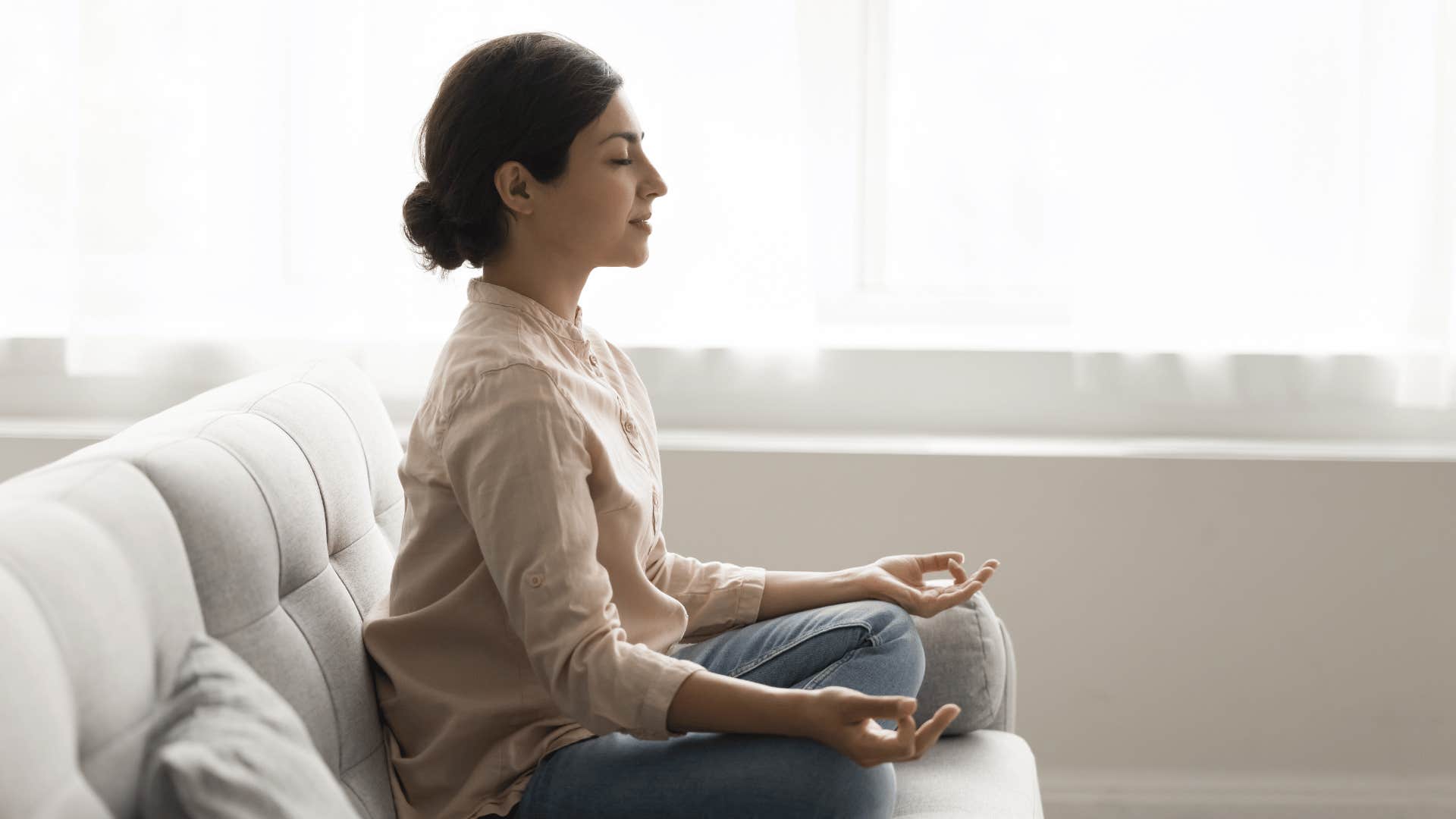 woman doing something mindful so she doesn't want to get back in bed