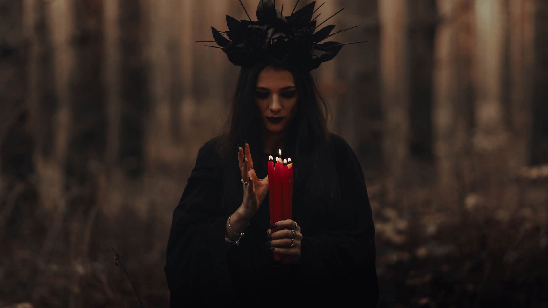 woman casting spell with the song good luck babe