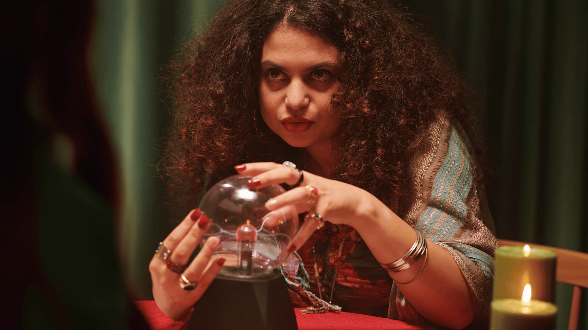 woman casting spell with the song rolling in the deep