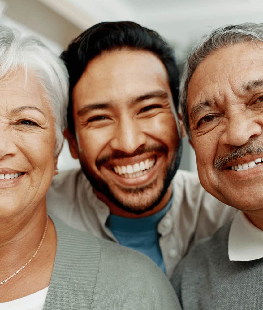 Smiling man's parents are ready to meet other family members