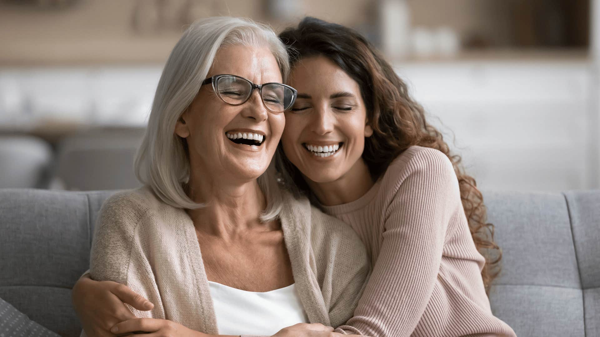 smiling woman everyone respects hugging mother