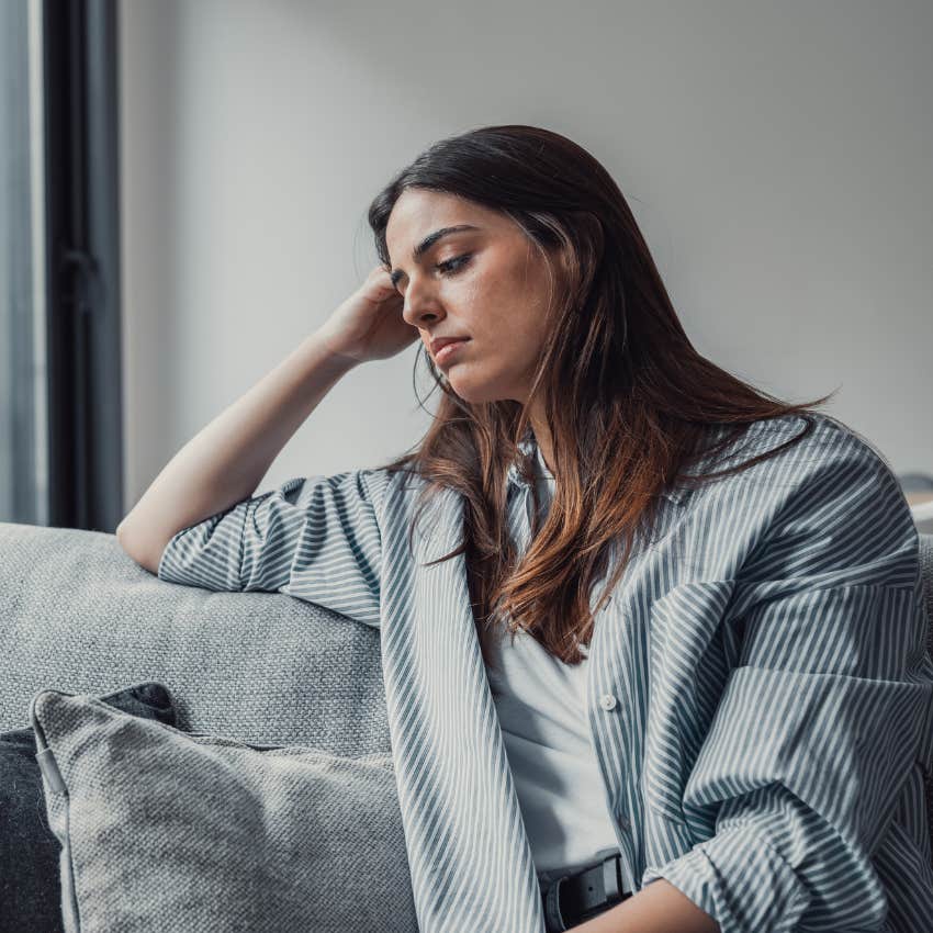 woman carrying burden of past with mental shift that will help heal childhood