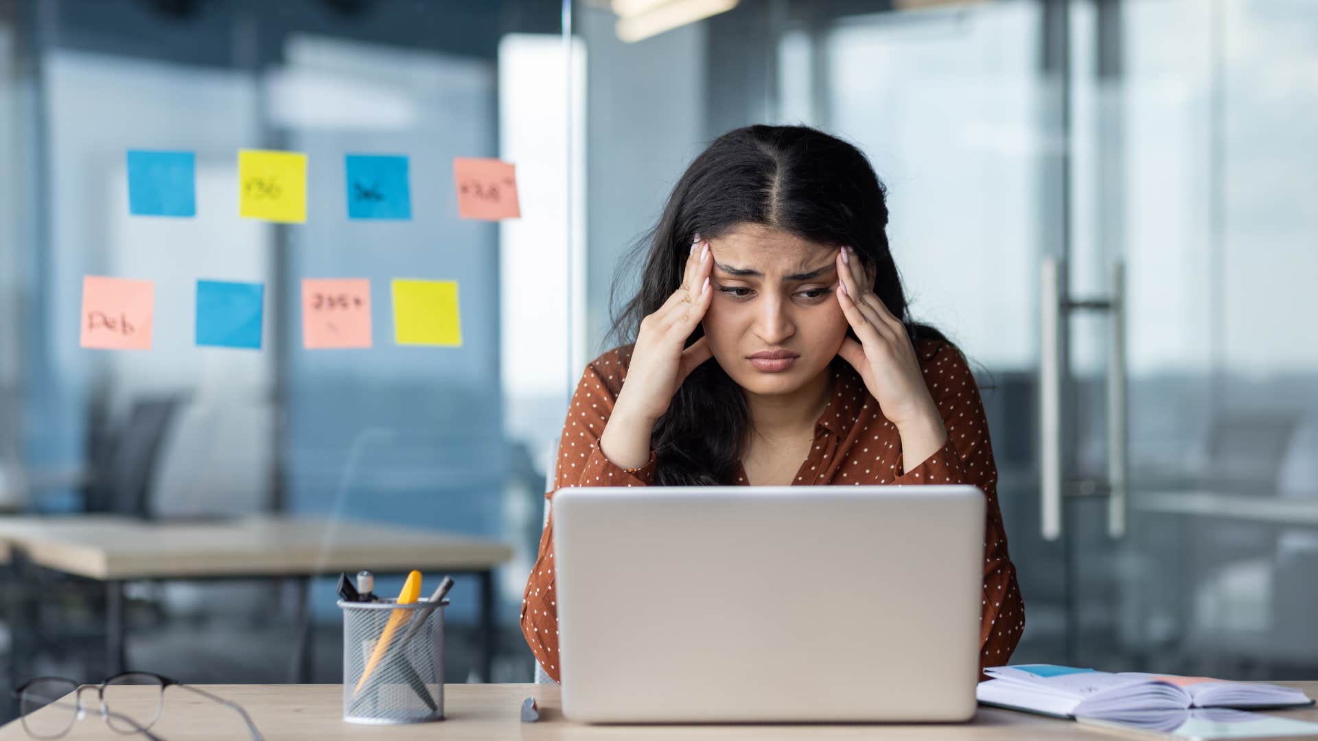woman struggling with work not asking for help