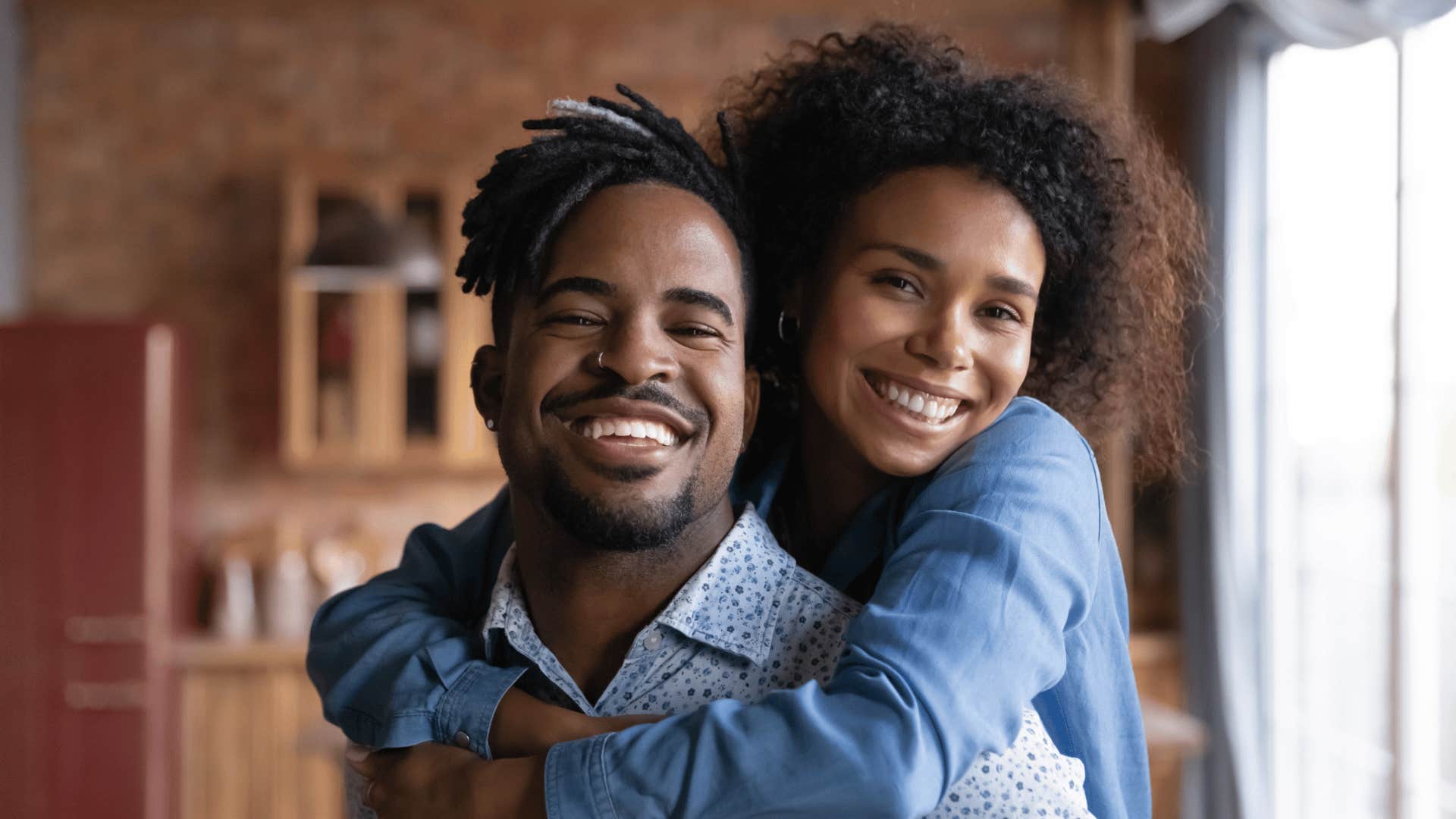 happy unmarried millennial couple