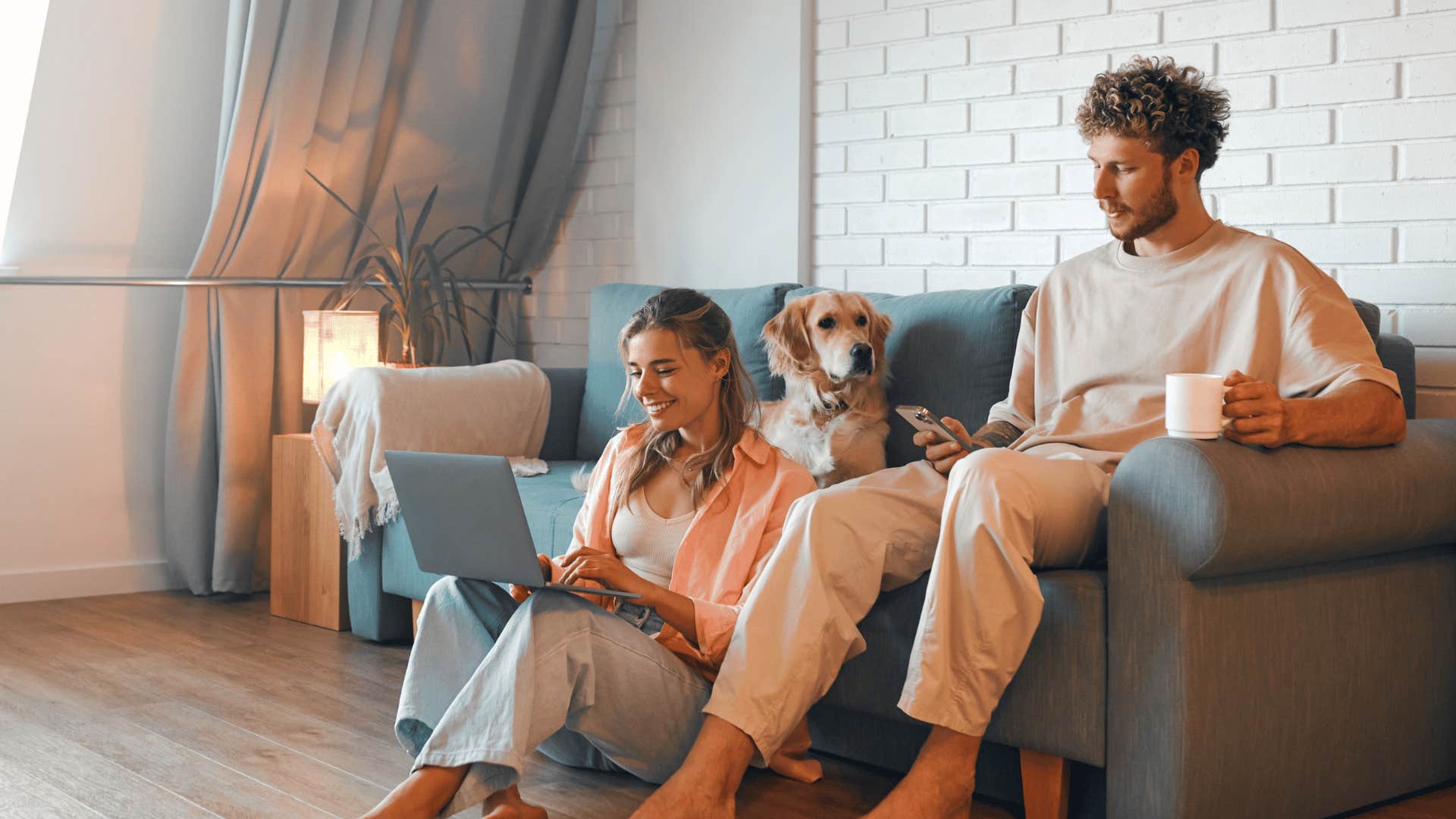 childfree millennial couple on the couch