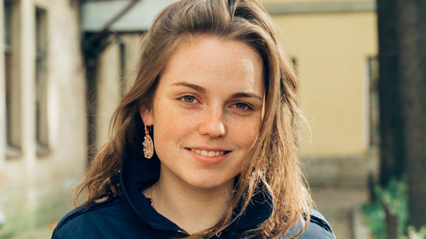 smiling millennial woman