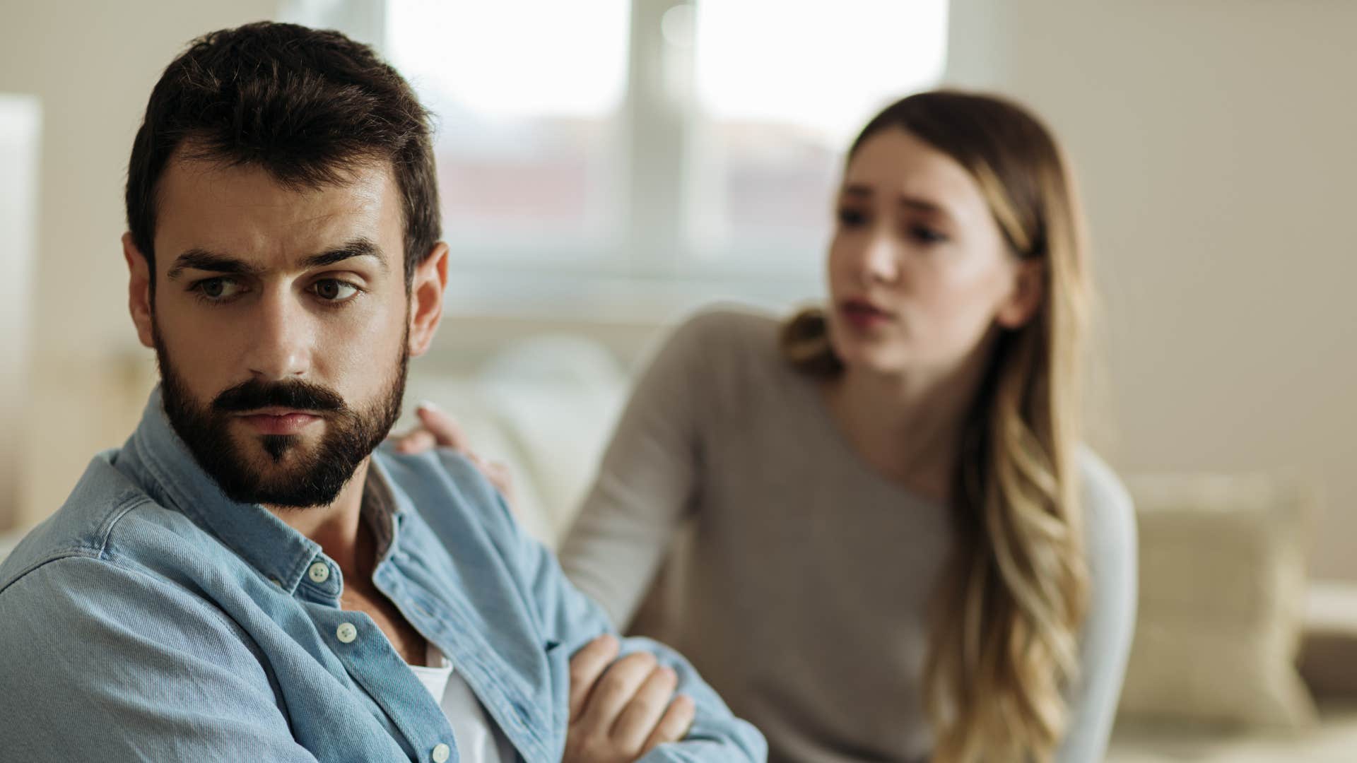 A wife offers constructive criticism to her husband showing she loves him