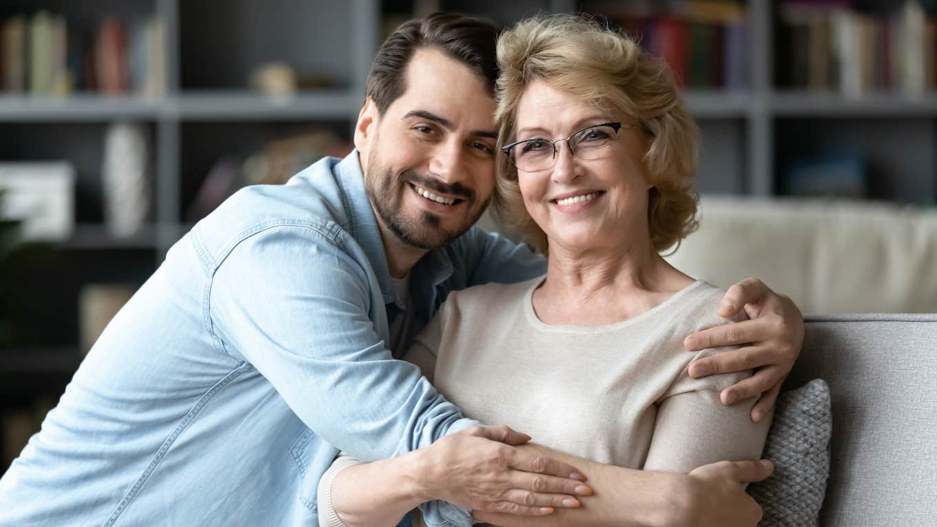 Things Adults Should Stop Expecting From Their Parents No Matter What son hugging his mother smiling