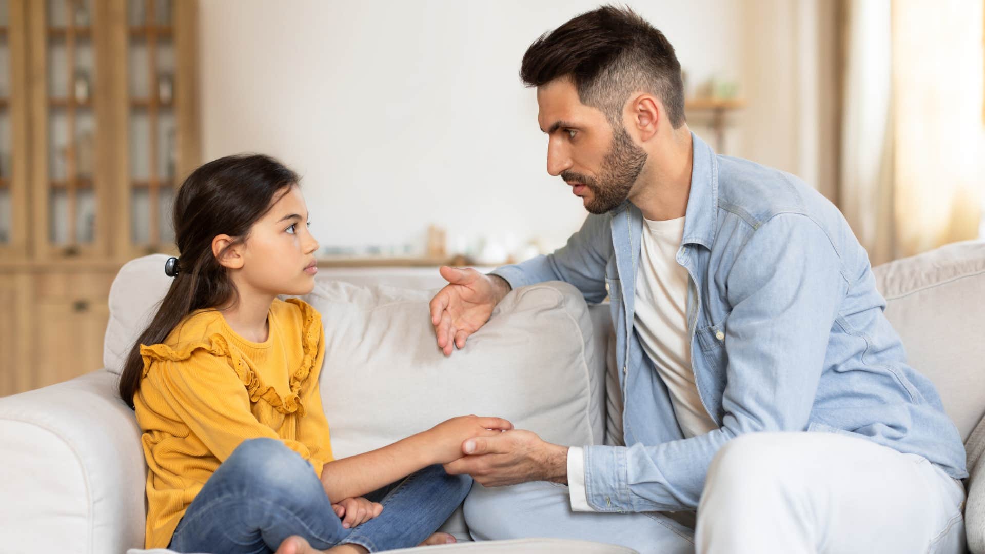 dad engaging daughter in important conversation
