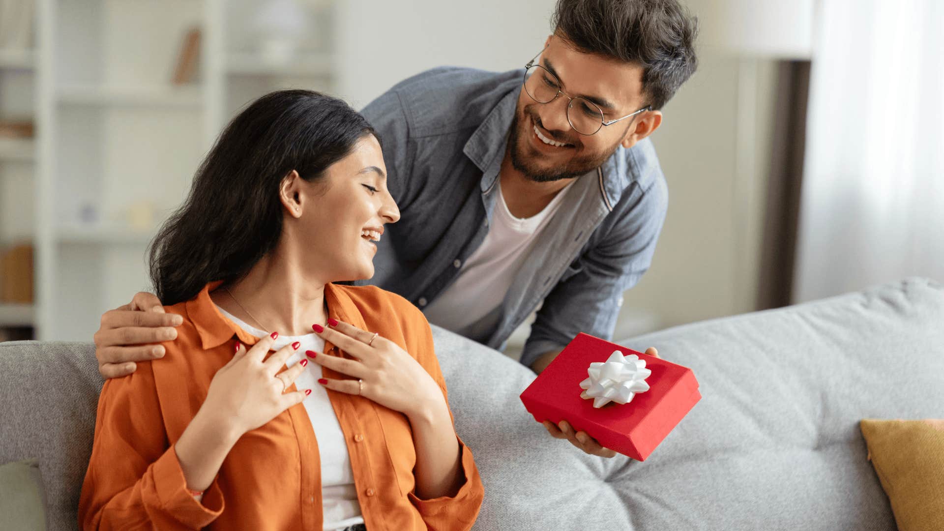husband who gets it giving wife a present