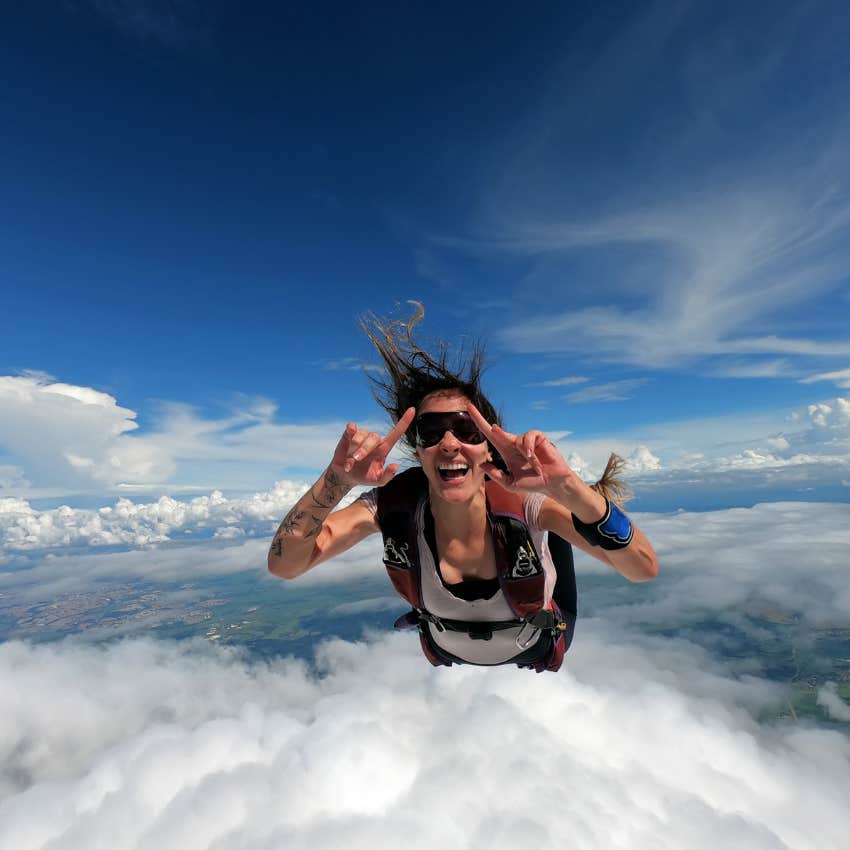 woman skydiving so she never settles