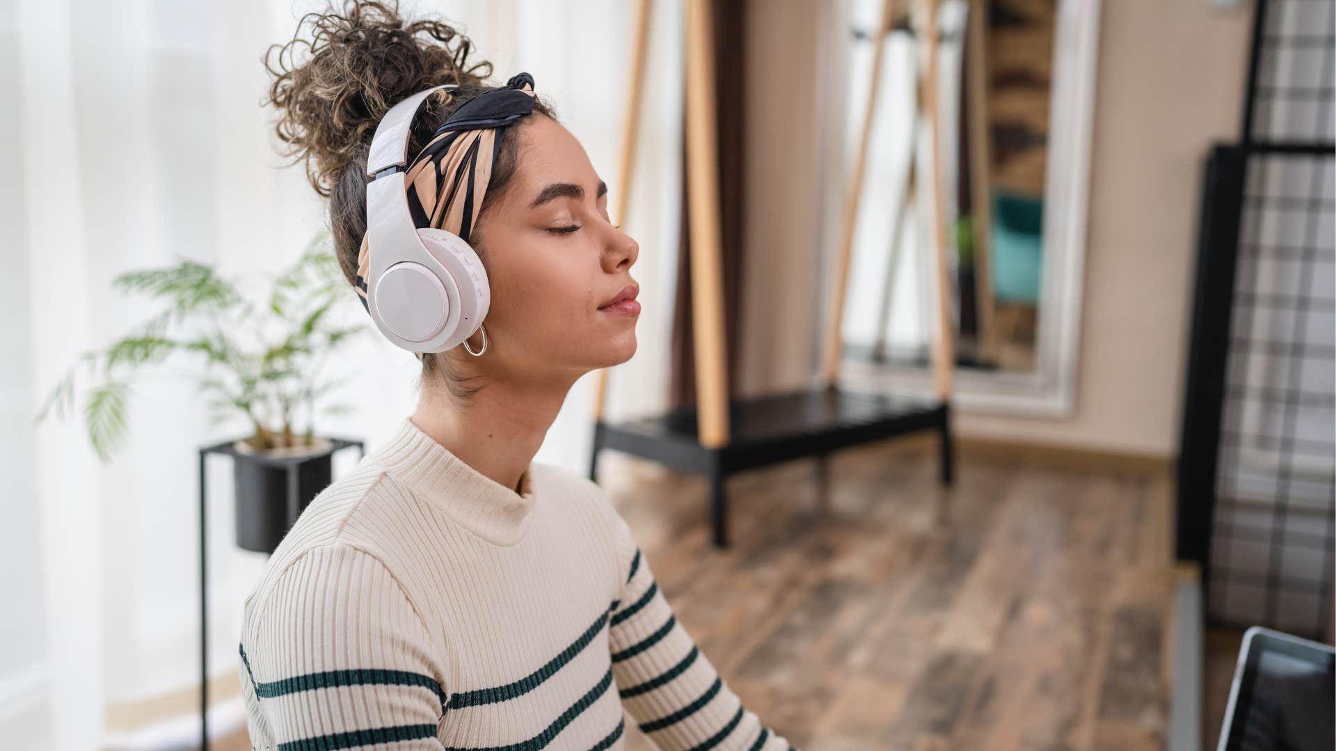 Gen Z woman listens to a full album