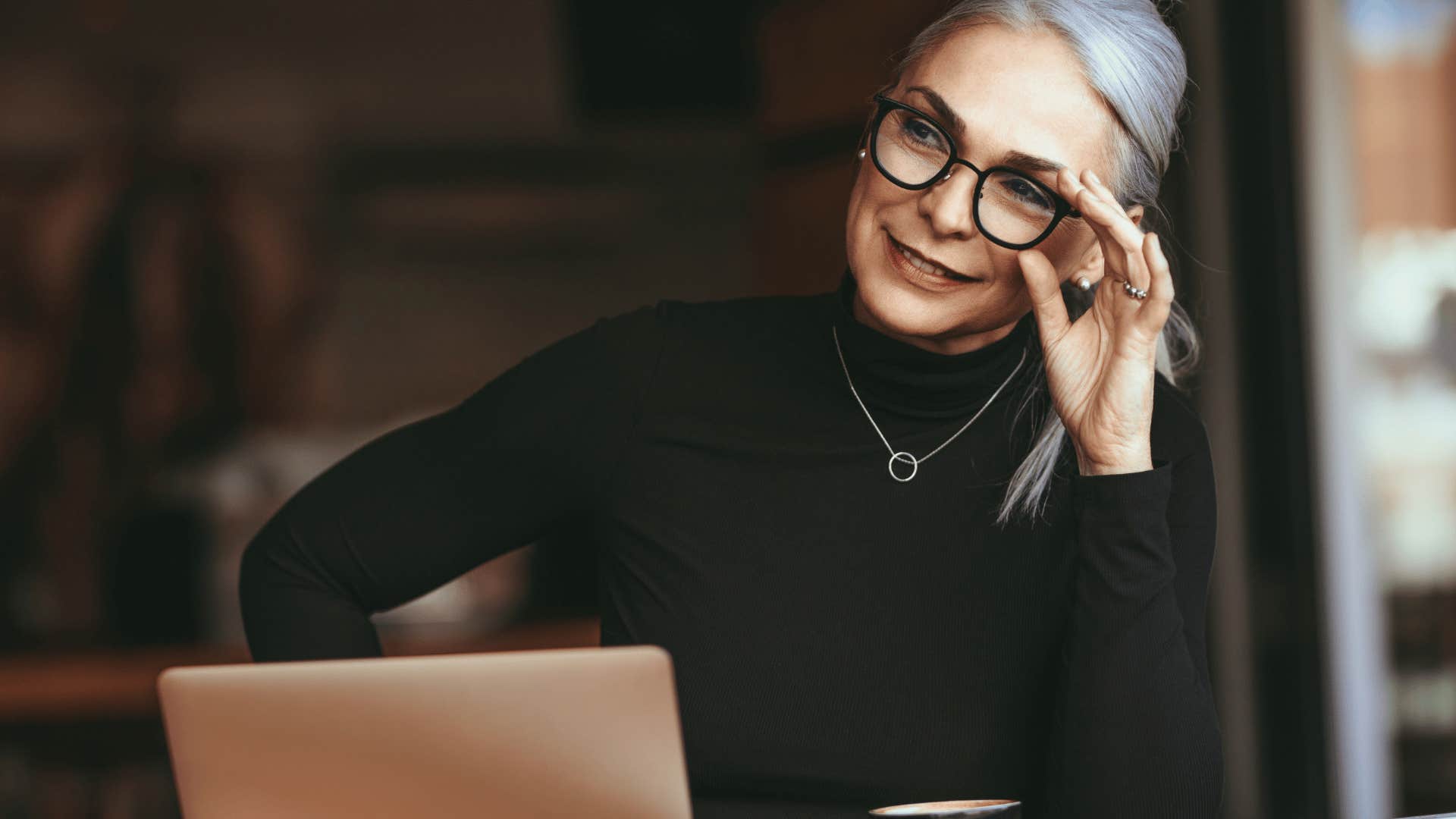 Happy woman doesn't care about trying to fix men