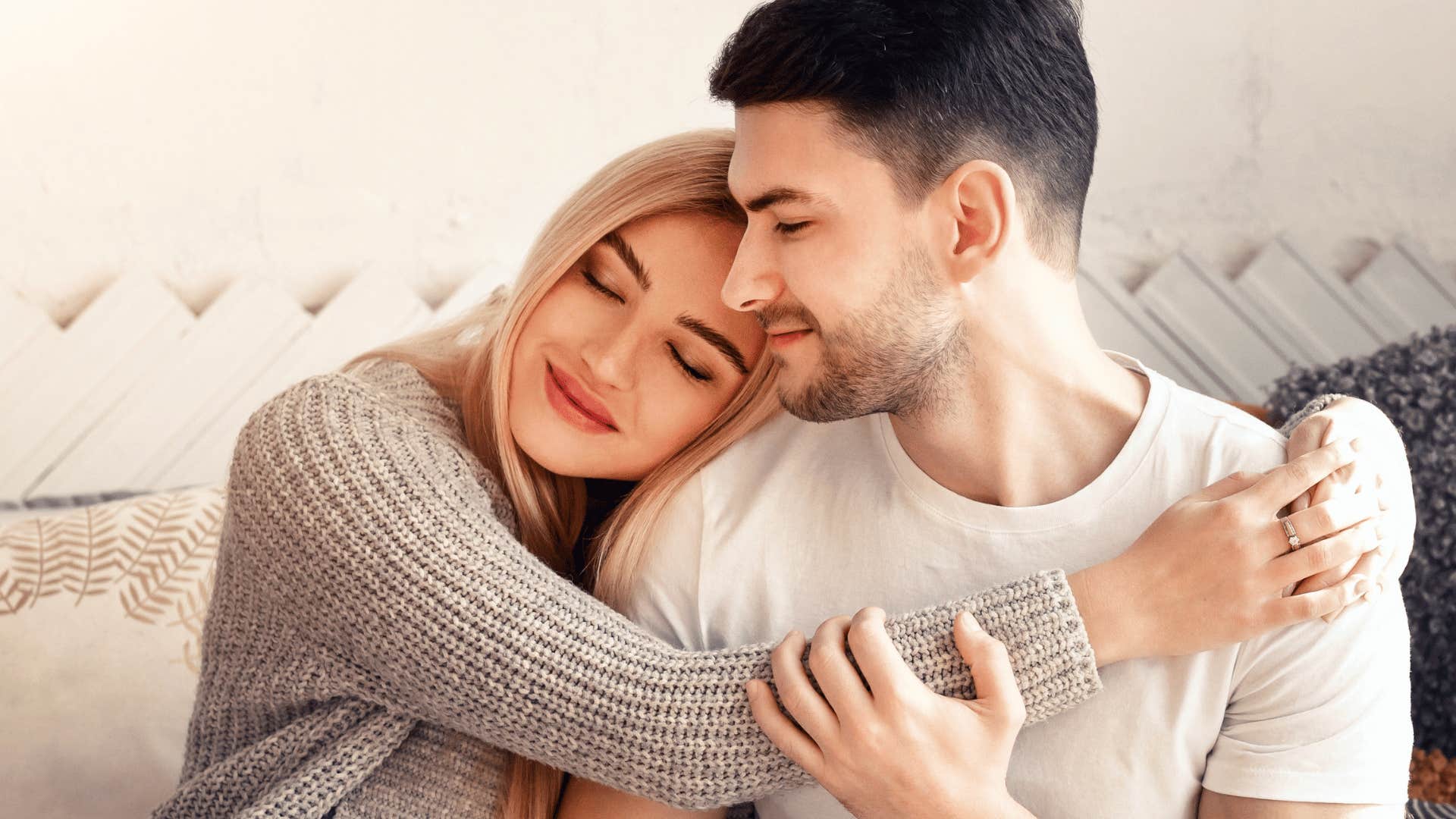 Happy woman holds man not resentment