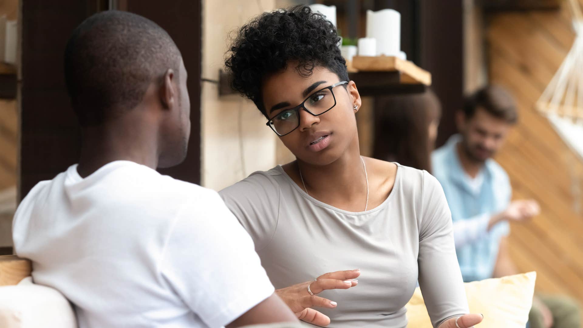 woman apologizing to man
