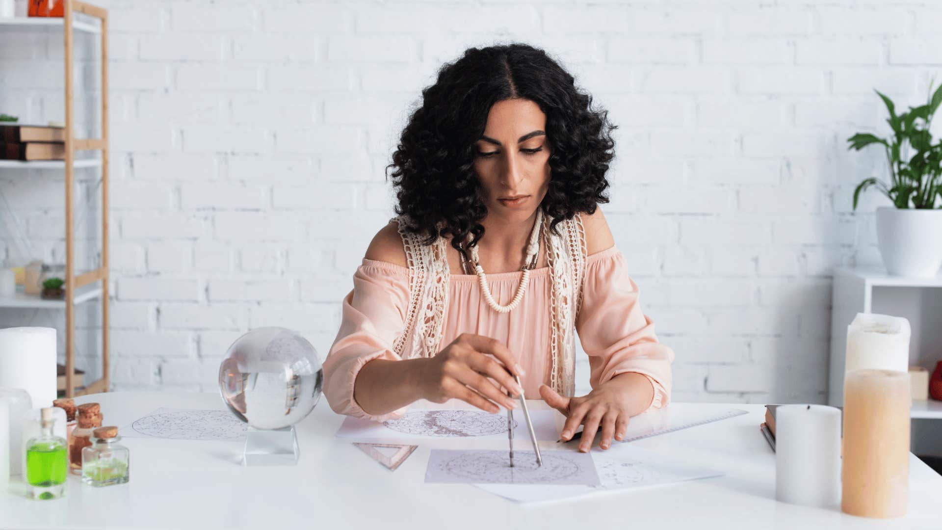 millennial woman creating an astrological chart