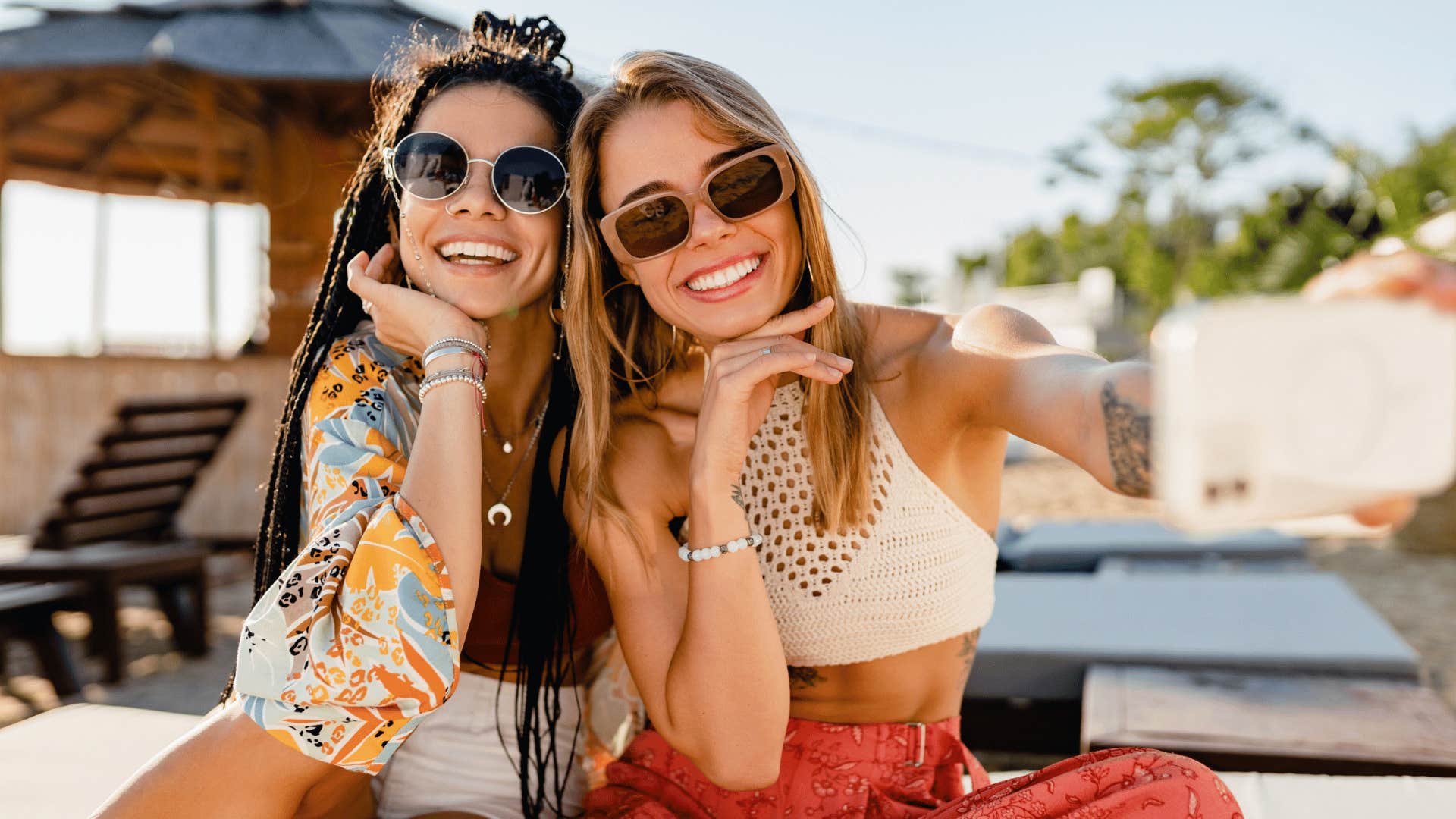 two millennial young women taking a selfie together