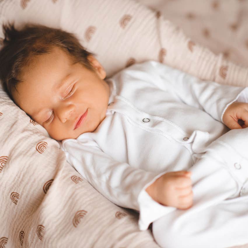 parents obessesing over sleeping baby