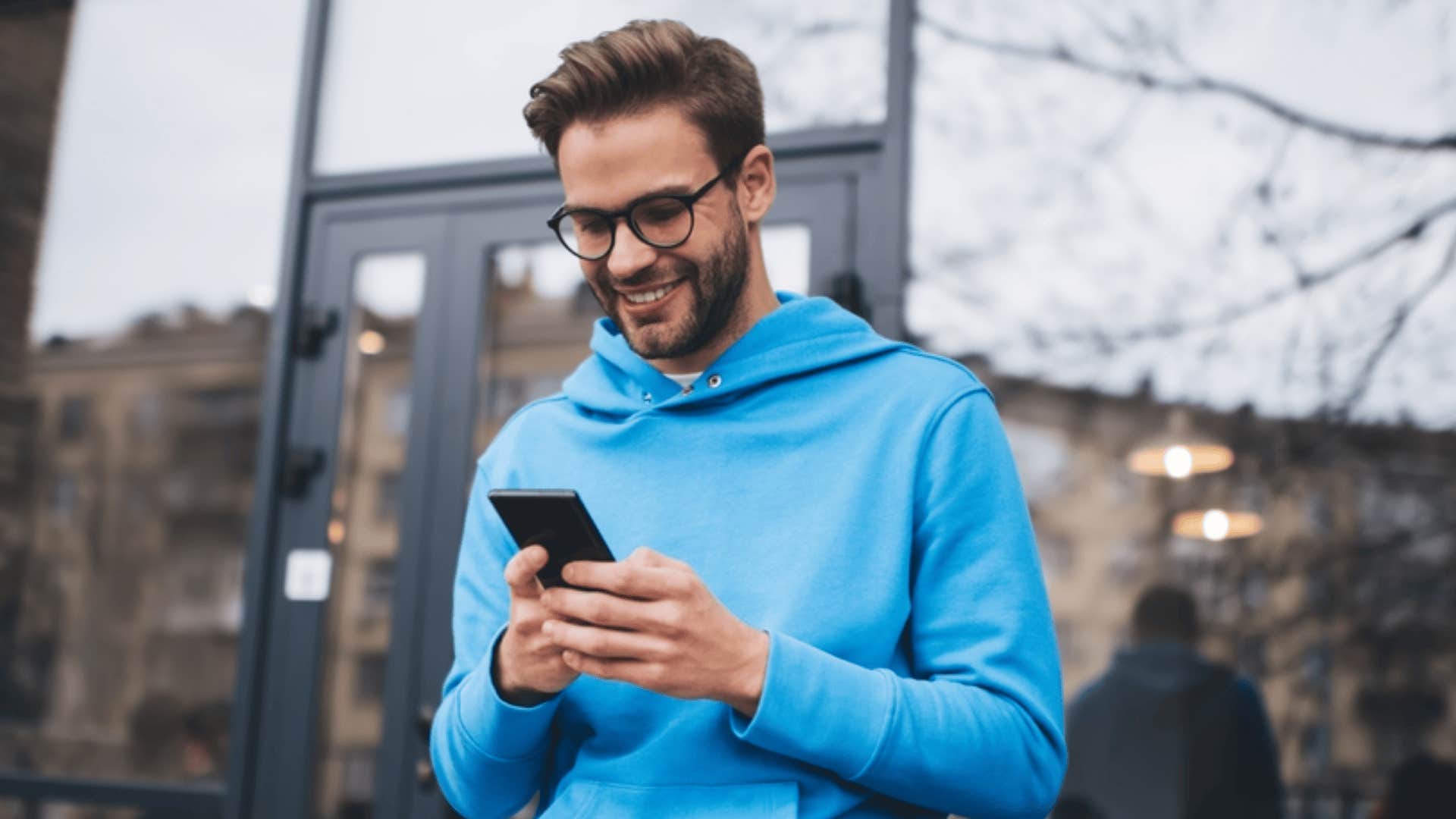 man looking at social media follower count 