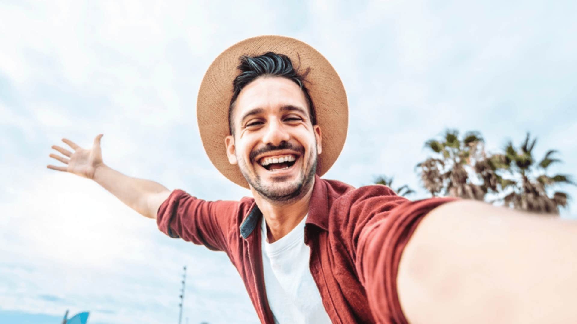 man showing off travel experiences 