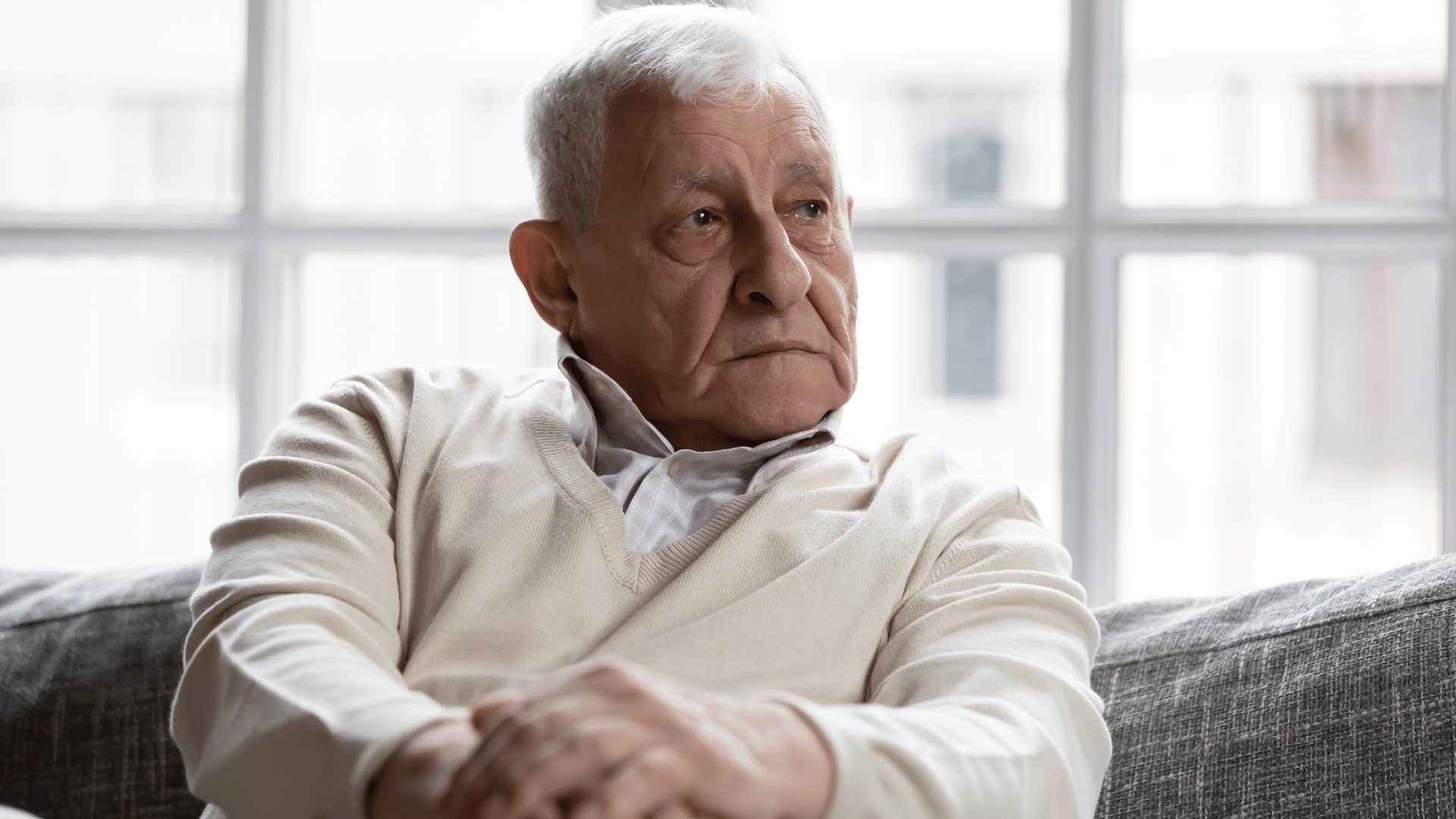 man looking pensive because people say boomers ruined the environment
