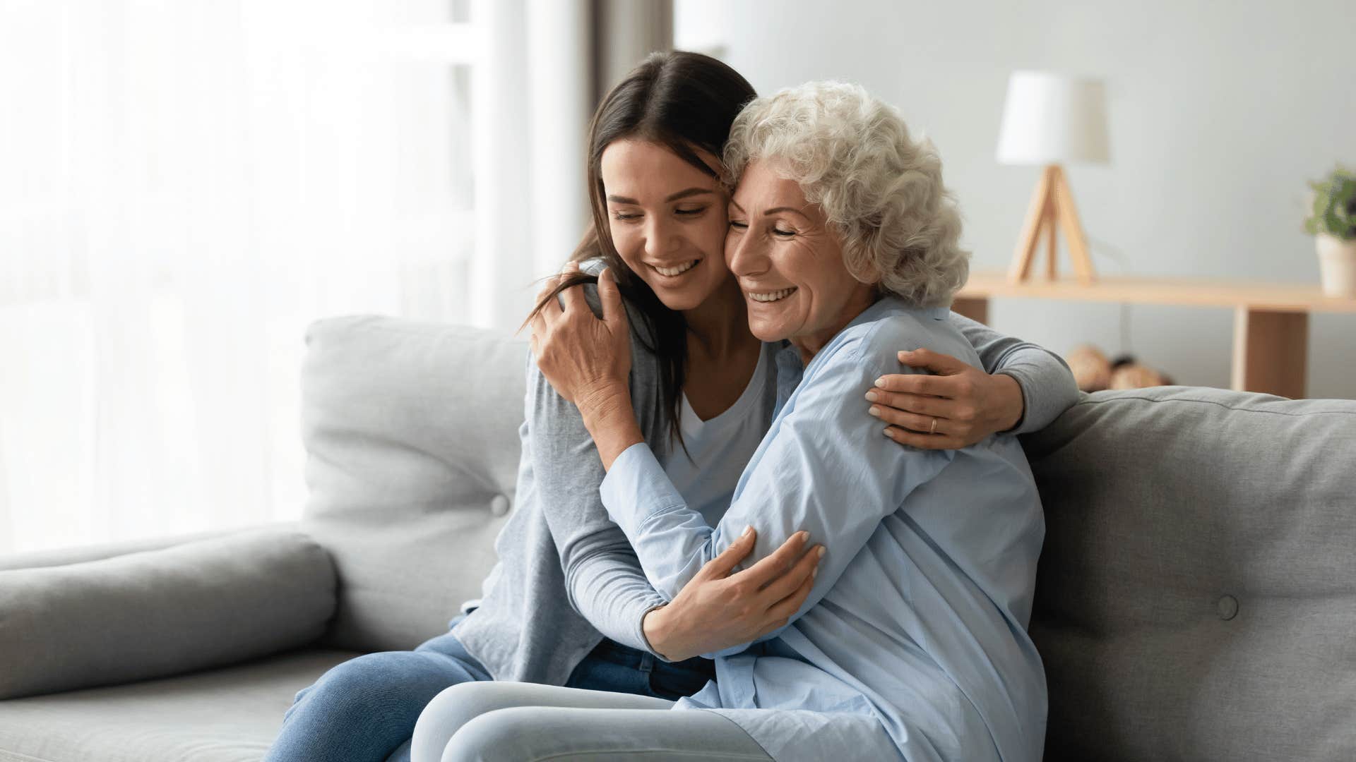 boomer woman hugging young woman because she doesn't actually hate young people