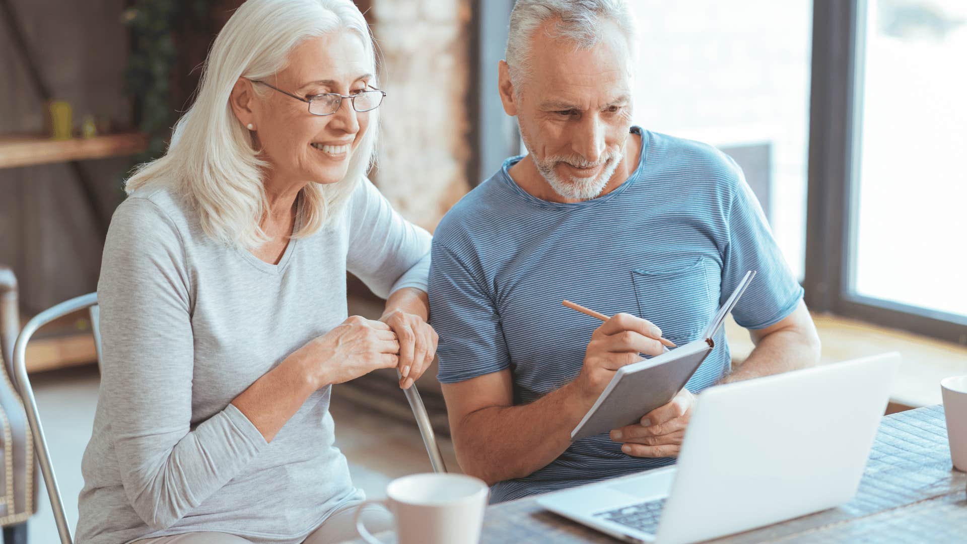 boomer couple reading the news despite people saying they're out of touch with current events