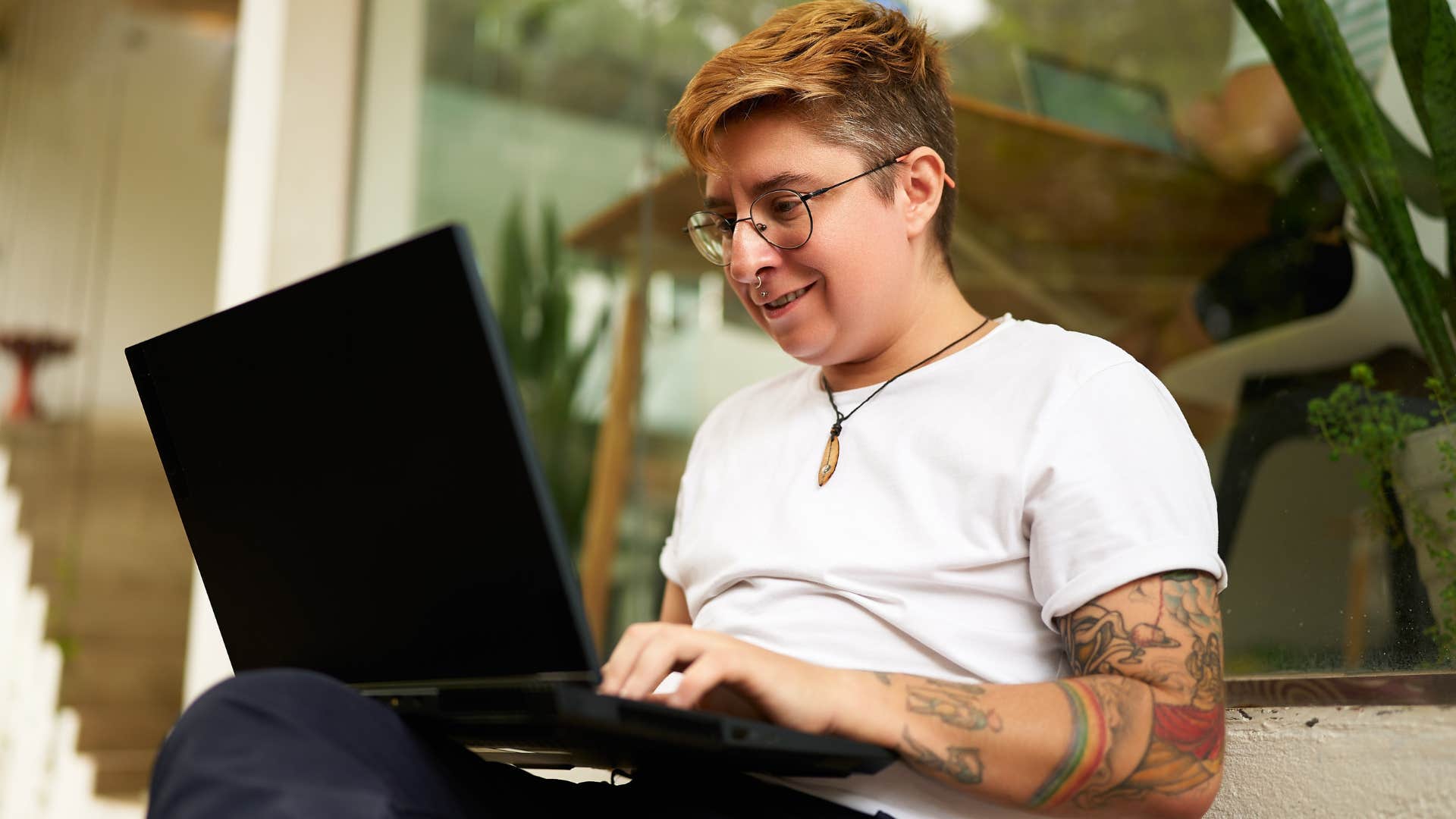 lazy Gen Z person working on their laptop
