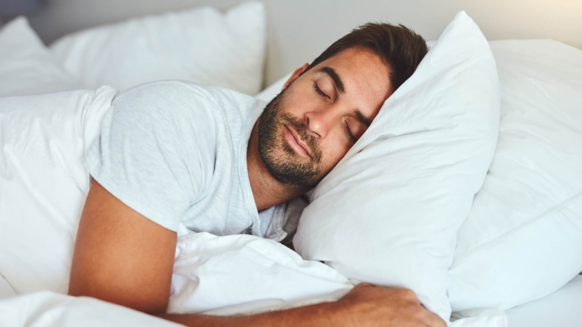 man spending time sleeping