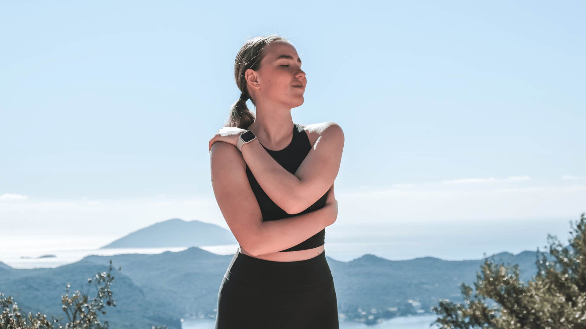 millennial woman out in nature focused on healing process