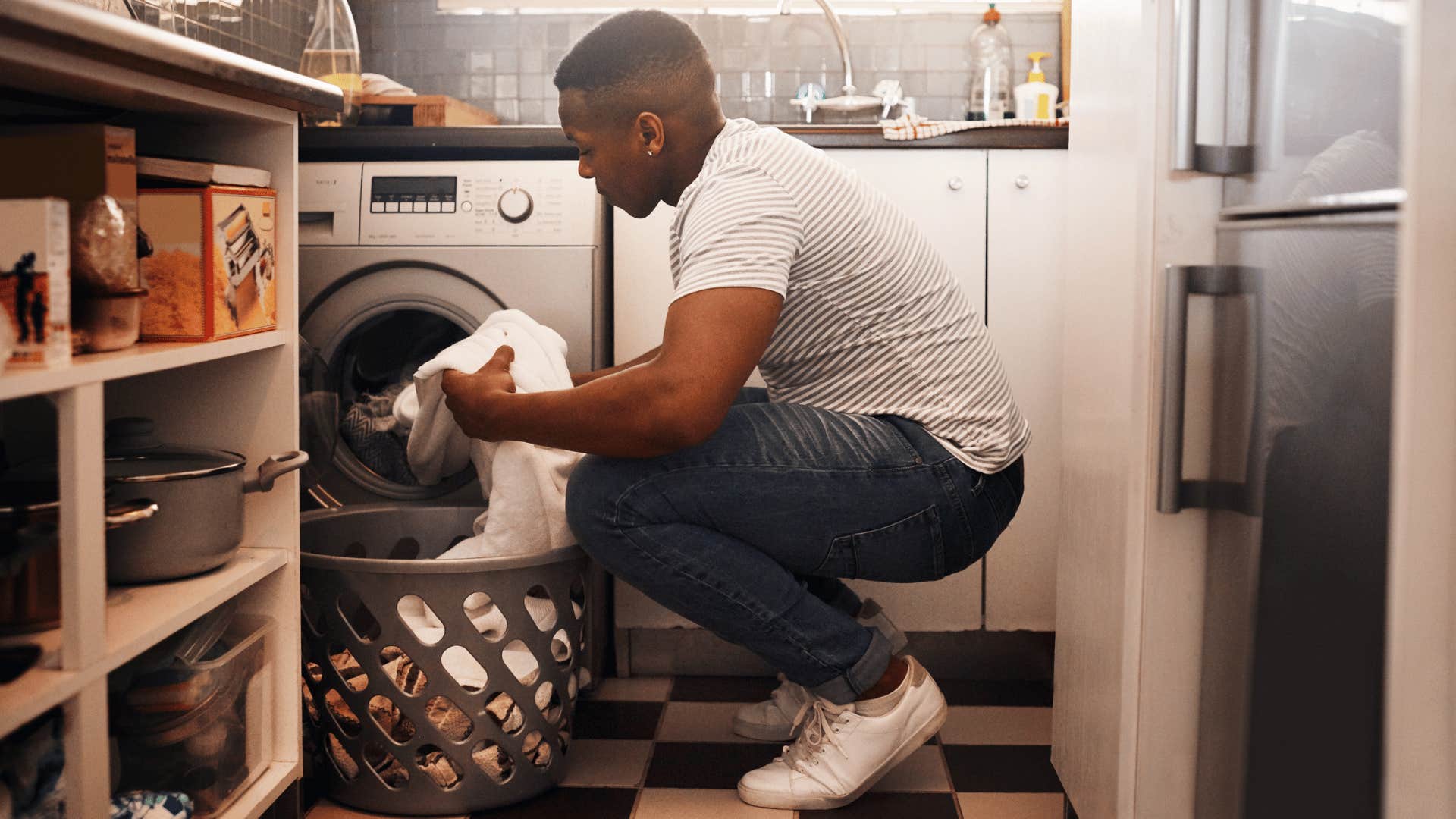 Man whose parents raised him well does laundry