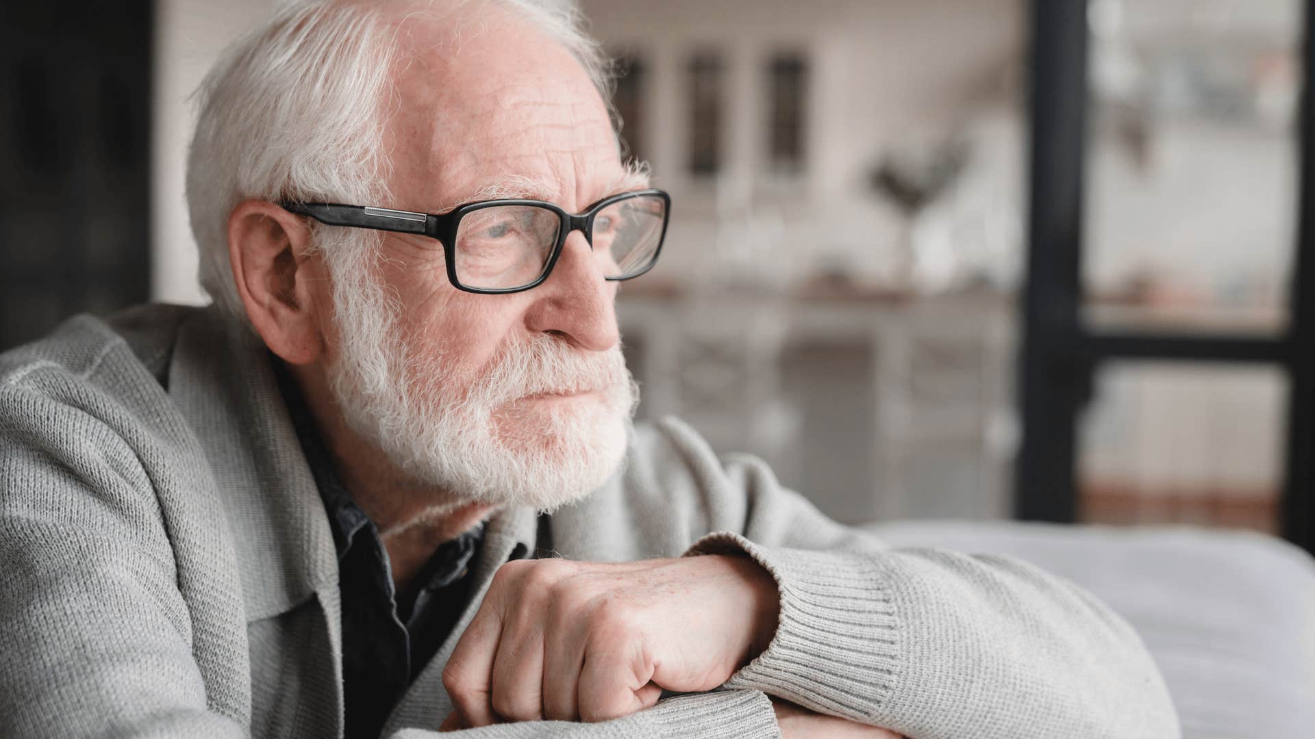 Sad older man grieving and no longer considered mentally ill because of it