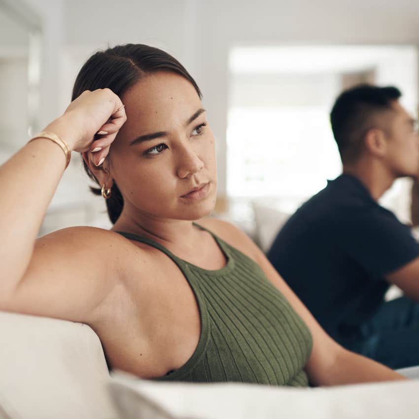 upset couple on couch whose relationship is way pasy saving