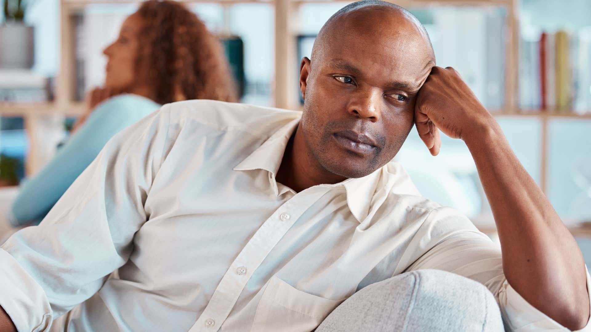man turned away from woman to avoid conflict