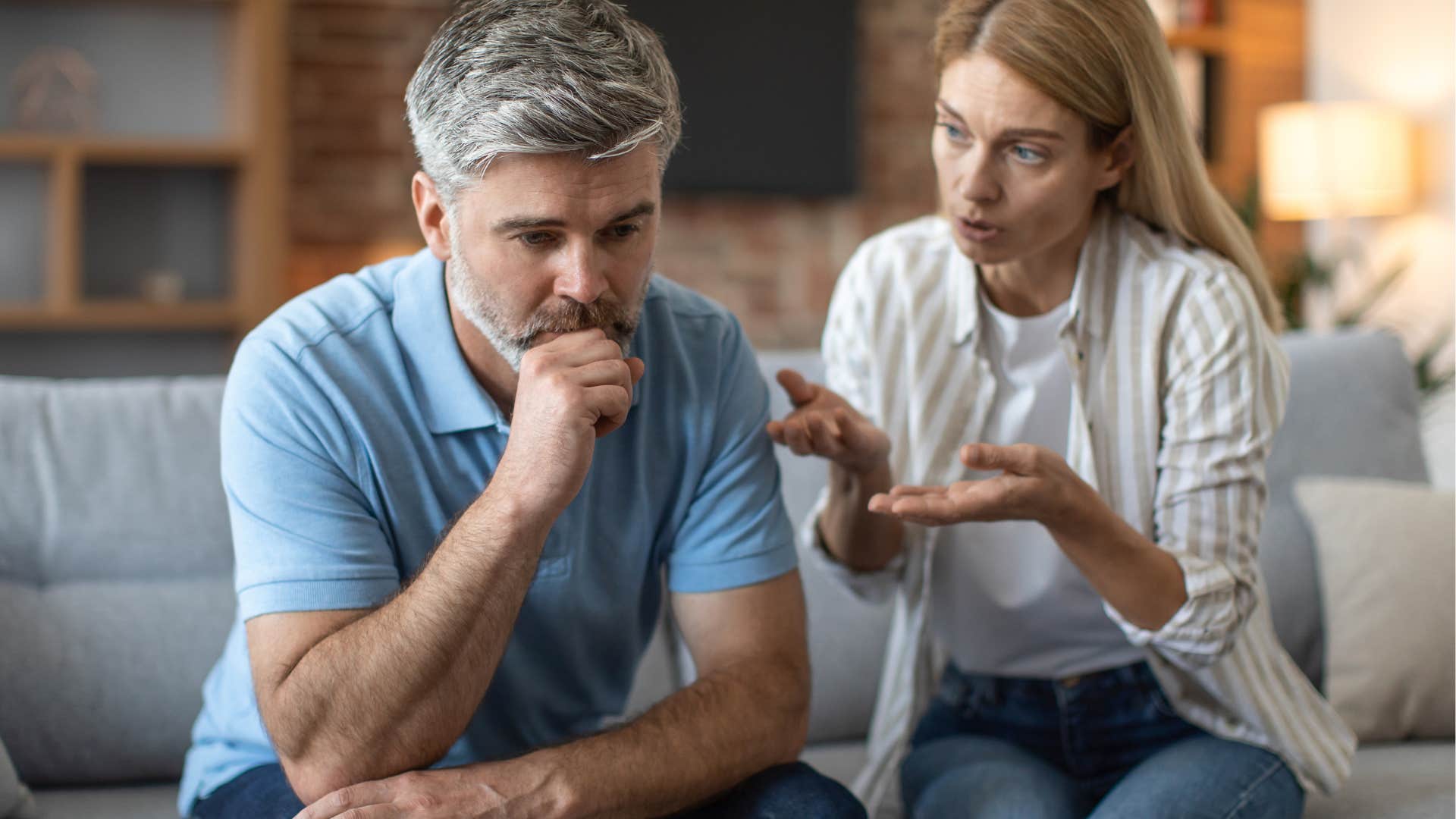 man in one-sided relationship turned away from woman arguing