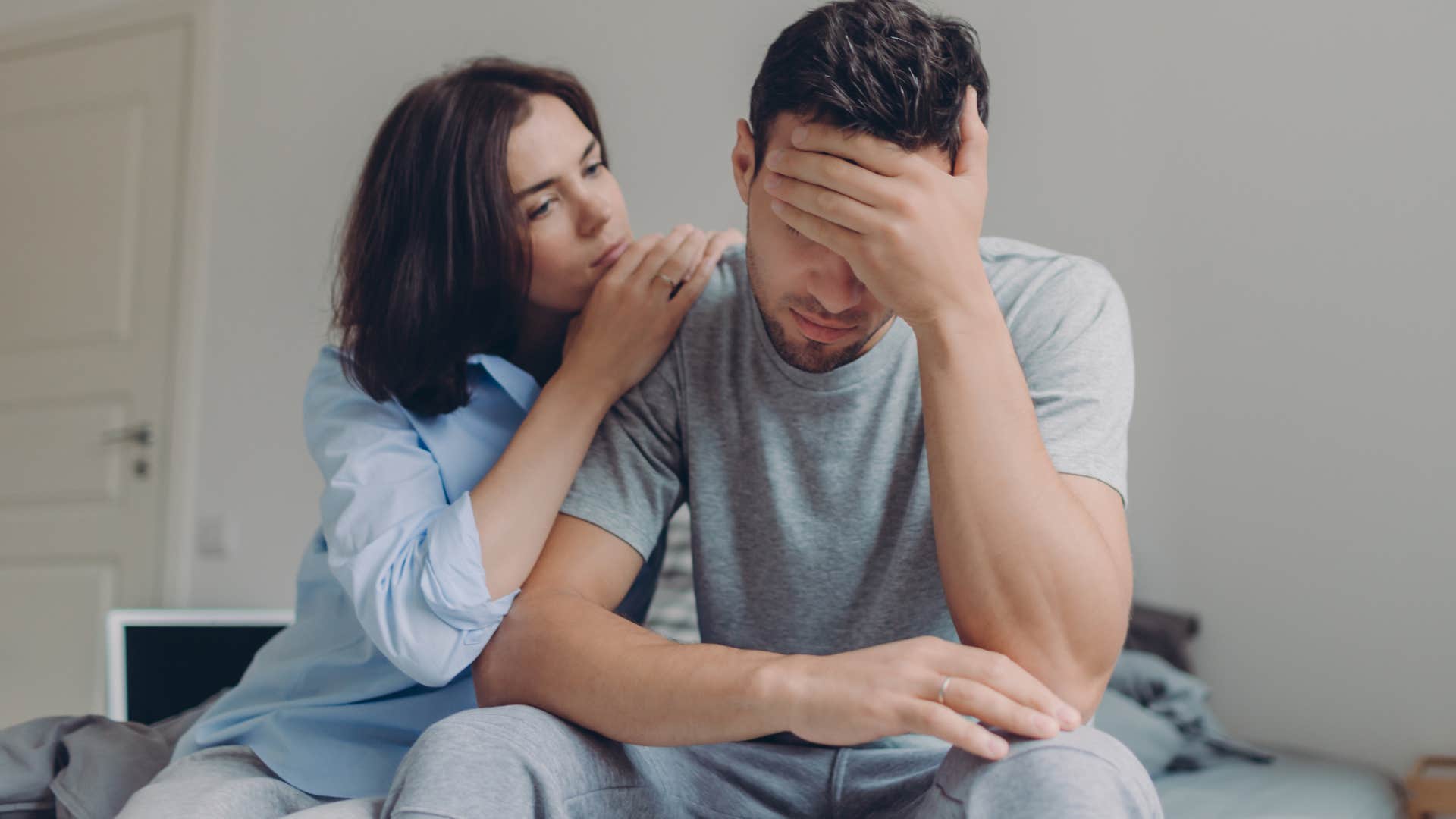 woman comforting partner whose values don't align with hers