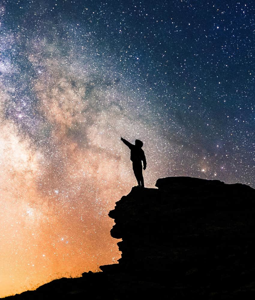 A visionary touches stars in a lucid dream