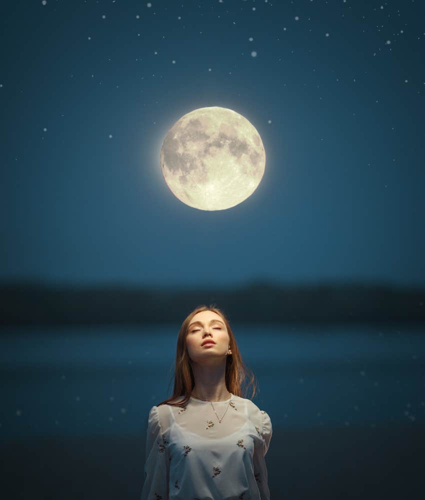 Woman seeking vision under full moon light