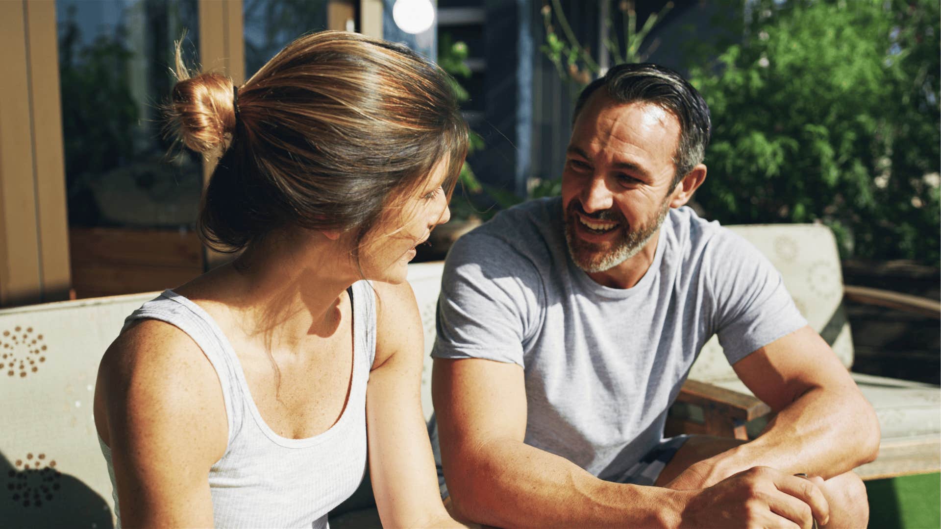 man talking to female friend as a vulnerable secret about men