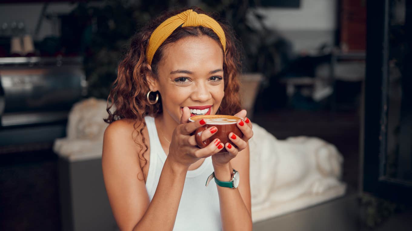 The Way You Like Your Coffee Reveals A Lot About Your Personality A woman who embraces her coffee preferences as a reflection of her personality