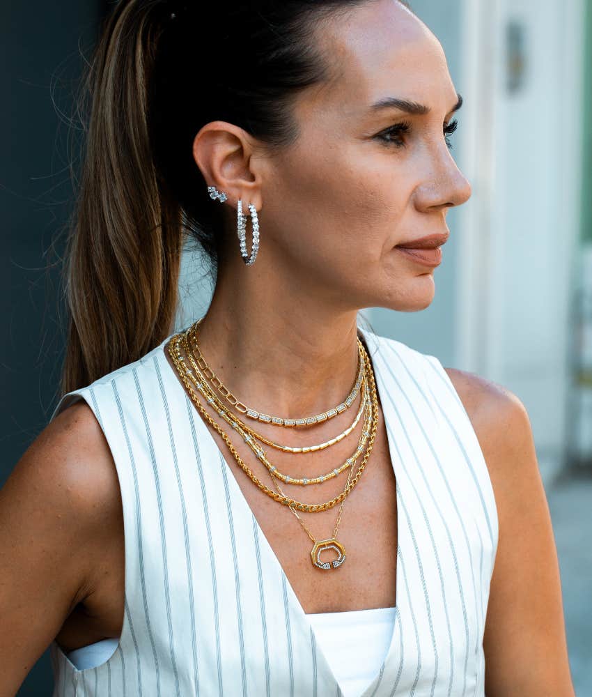 Free spirited woman wearing layered necklaces