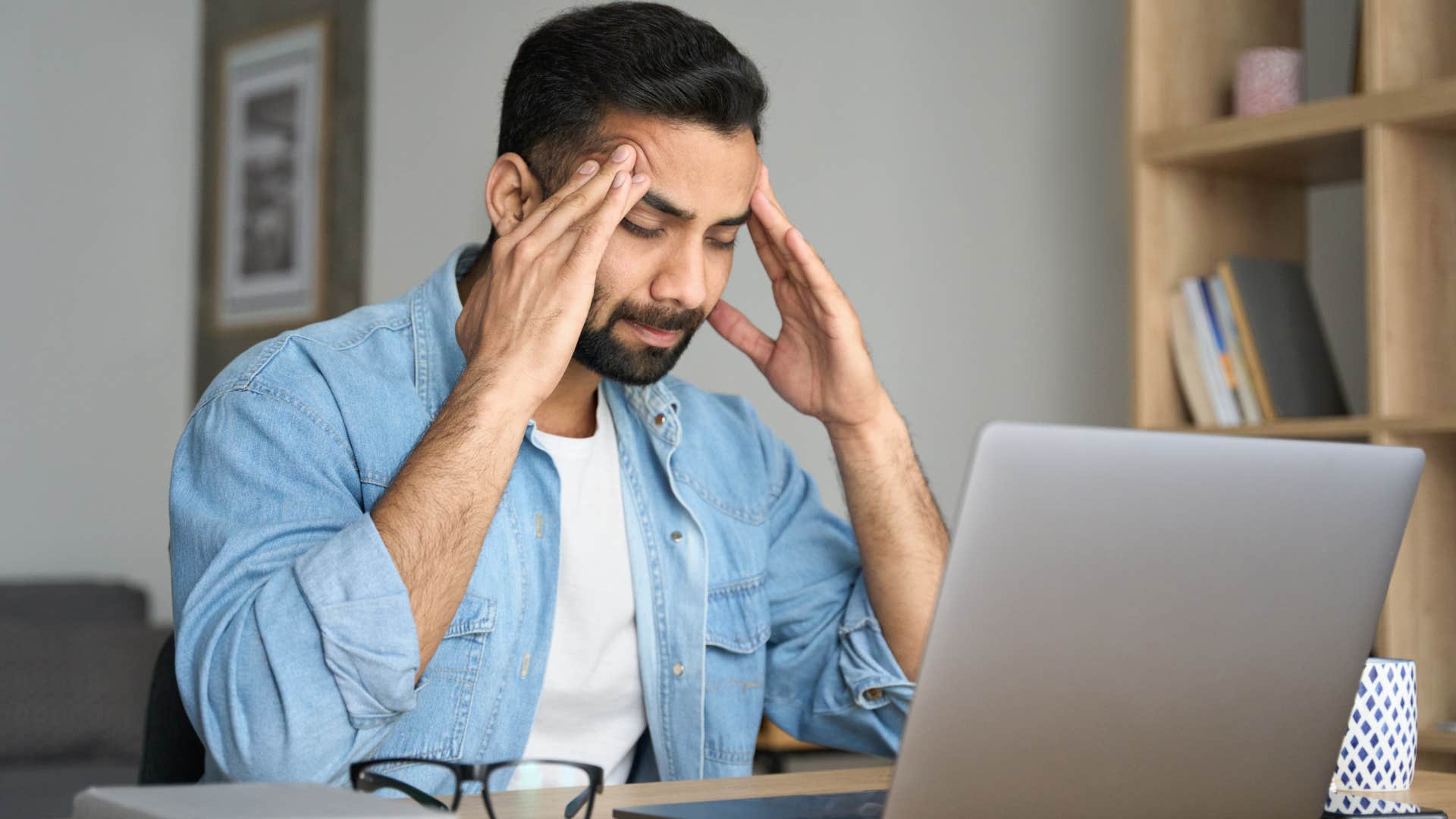 man afraid to leave his comfort zone looking stressed