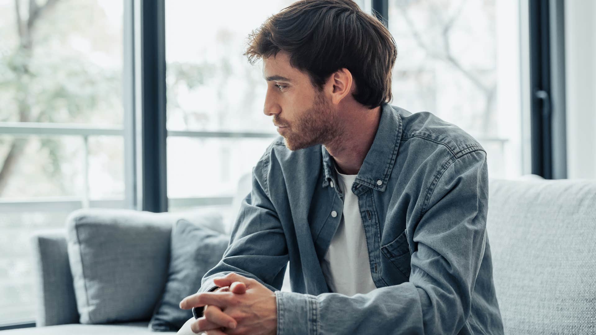 man thinking about grudge hes holding