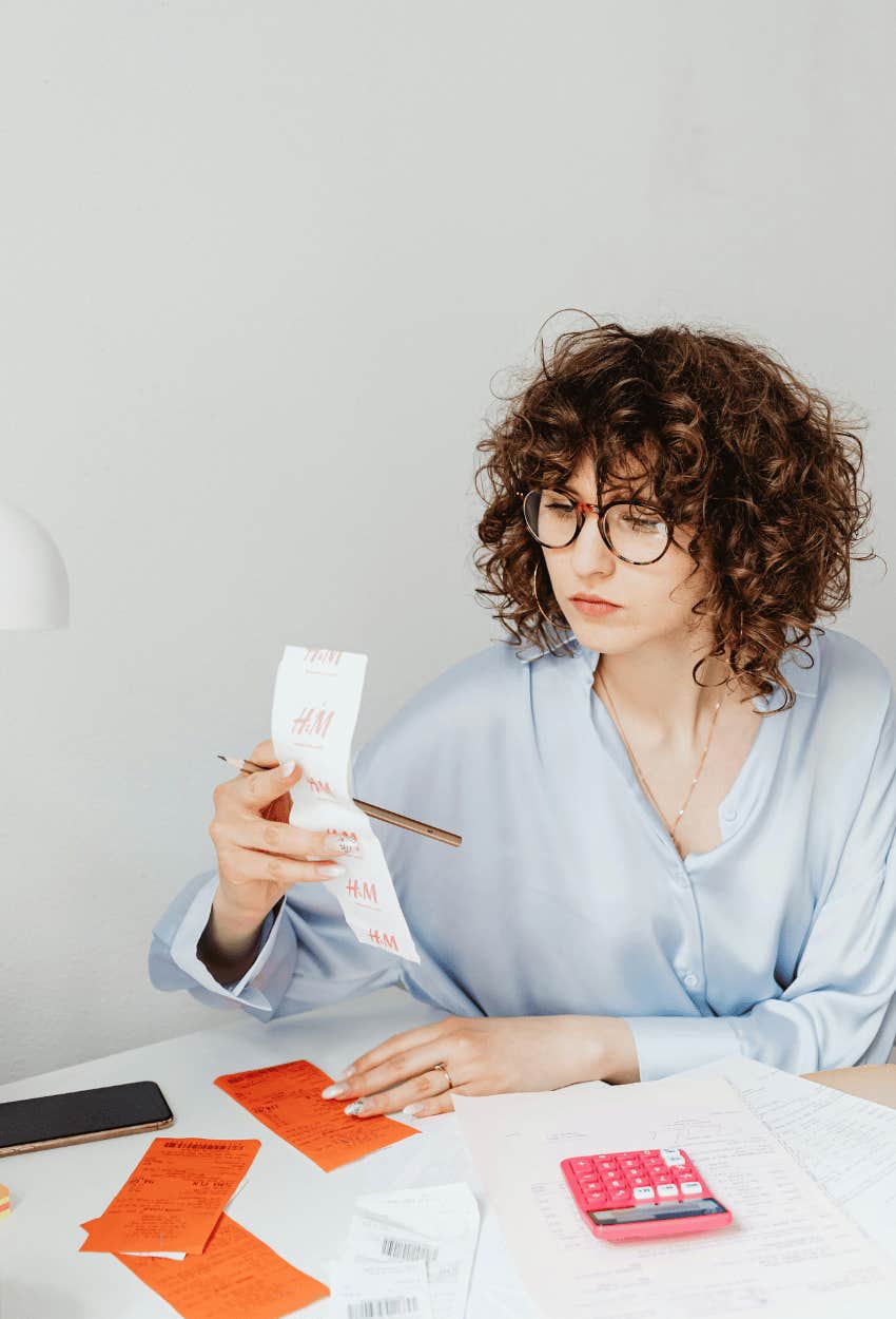 woman saving money immediately by ending her subscriptions