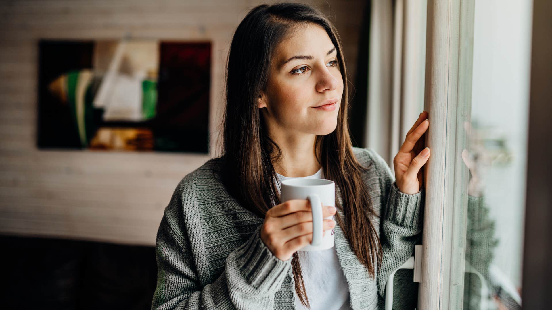 woman at home alone adopting solitude ritual