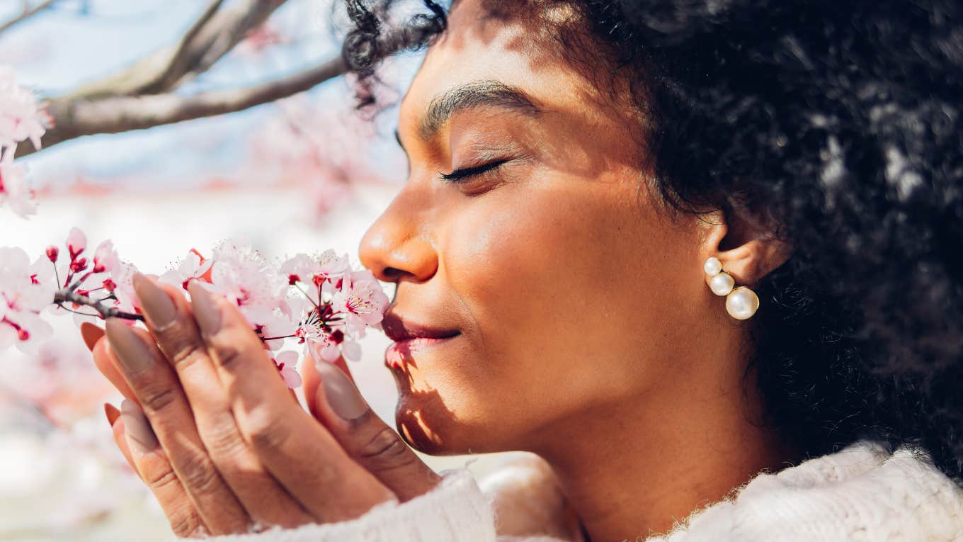 Woman enjoying spring and nature after spending two weeks without the internet