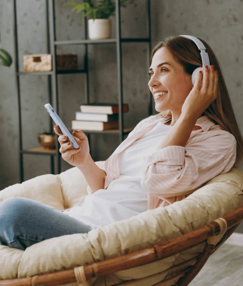 woman listening to audiobook to increase income