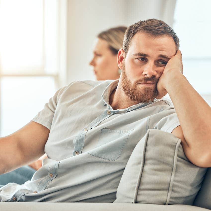 upset man sitting next to unforgettable woman