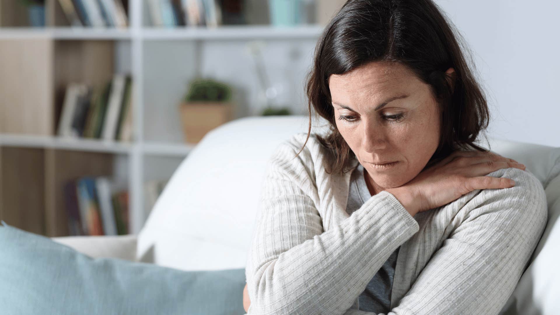 upset woman looking down