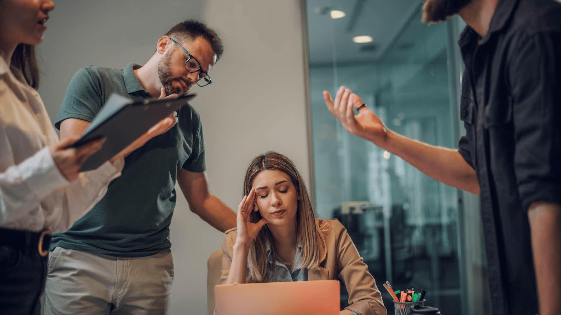 woman feeling overstimulated at work